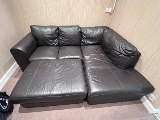 Brown leather corner settee
