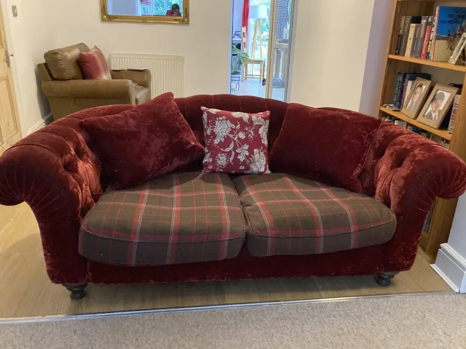 Bespoke 3 seater velvet chesterfield sofa. Deep raspberry colour. Made by John Sankey