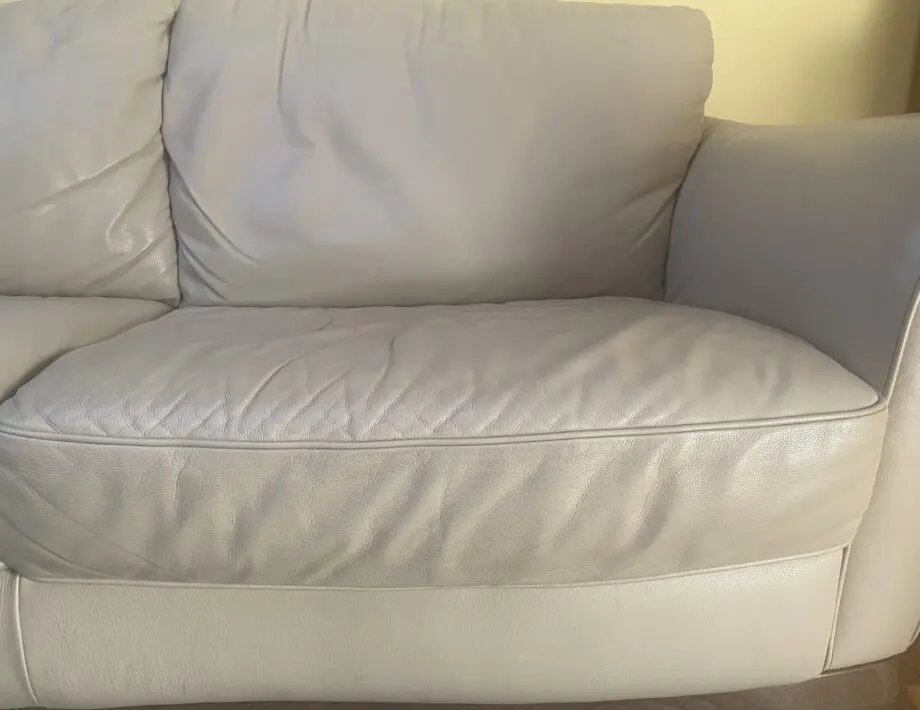 Quality leather and solid wood 3 seater cream sofa