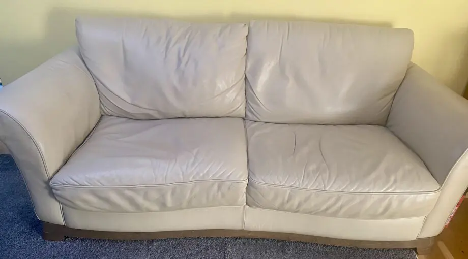 Quality leather and solid wood 3 seater cream sofa