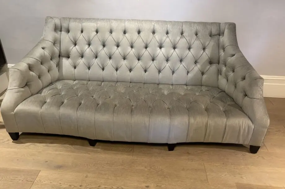 Andrew Martin silver/Grey 3 seater sofa with deep set buttons