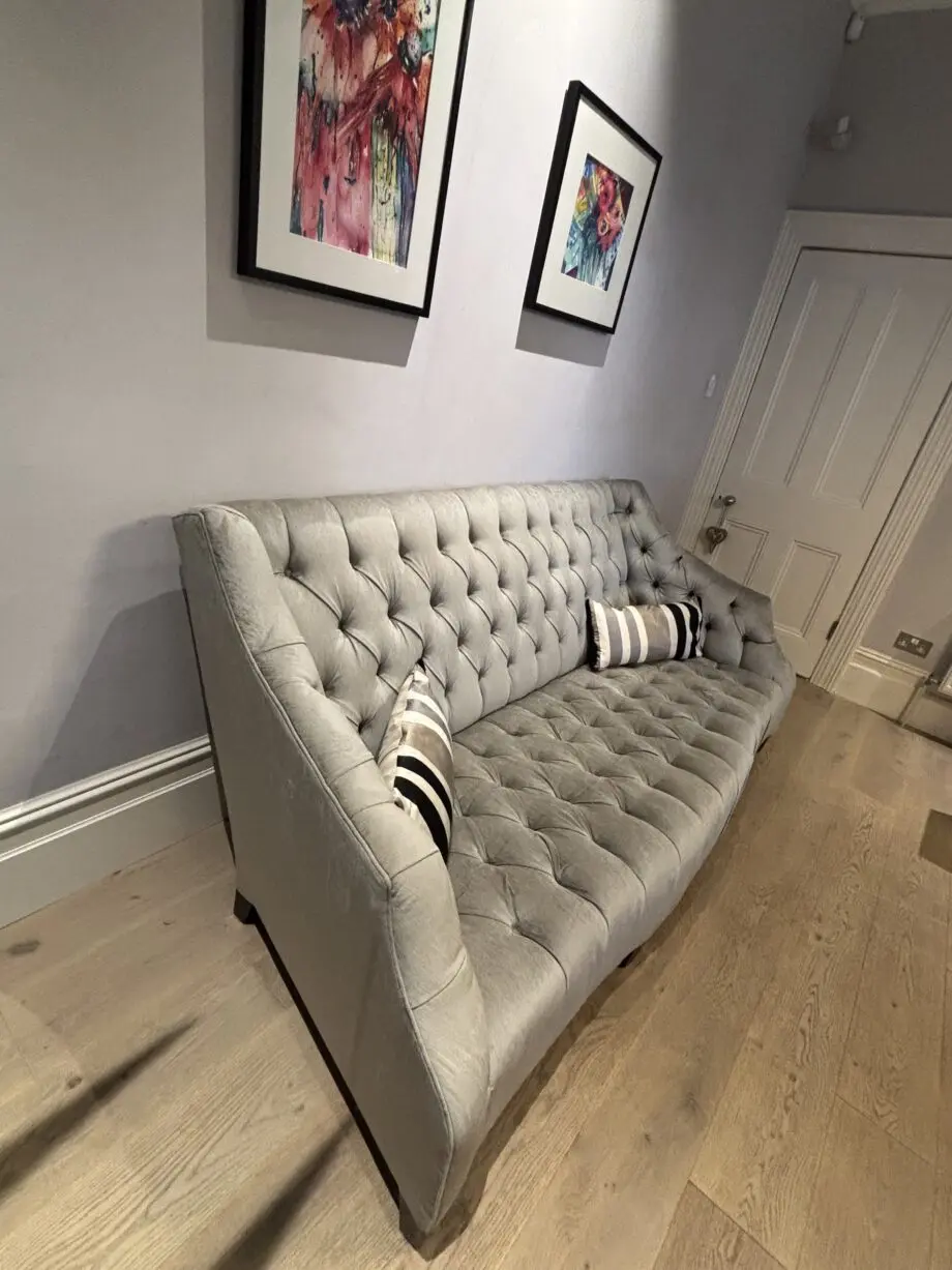 Andrew Martin silver/Grey 3 seater sofa with deep set buttons