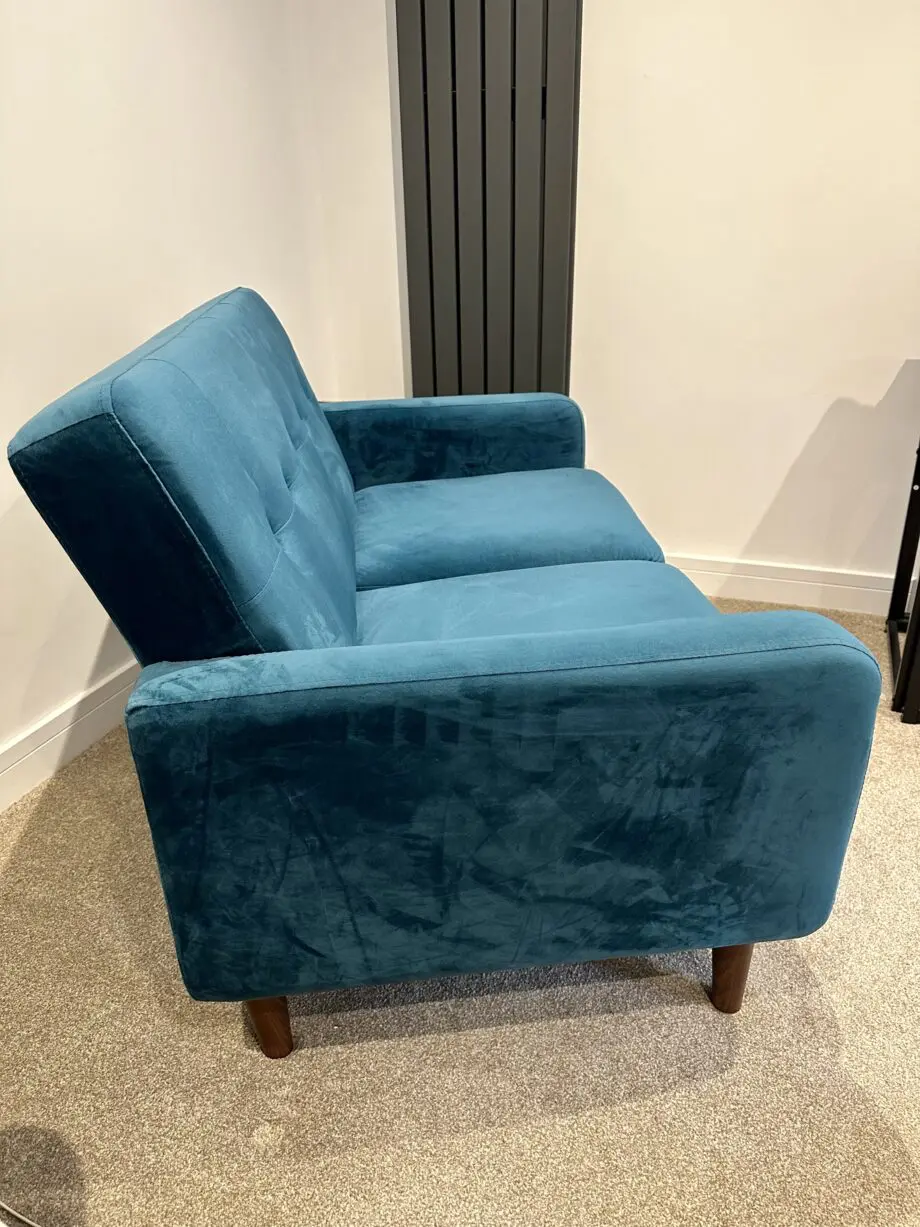 Teal coloured Casa Maria Designs two seater sofa in excellent condition