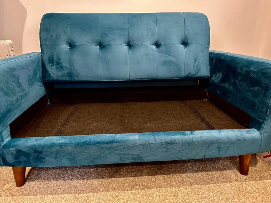 Teal coloured Casa Maria Designs two seater sofa in excellent condition