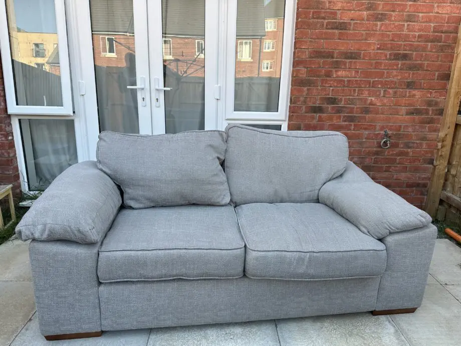 Grey colored fabric 2-seater