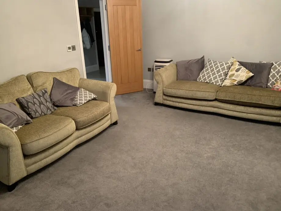 2 DFS green sofas plus 1 ottoman