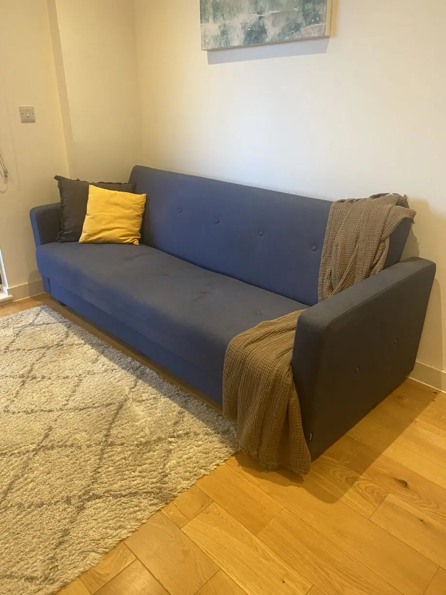 MADE Chou sofa bed - click clack 3 seater sofa. Navy blue with storage.