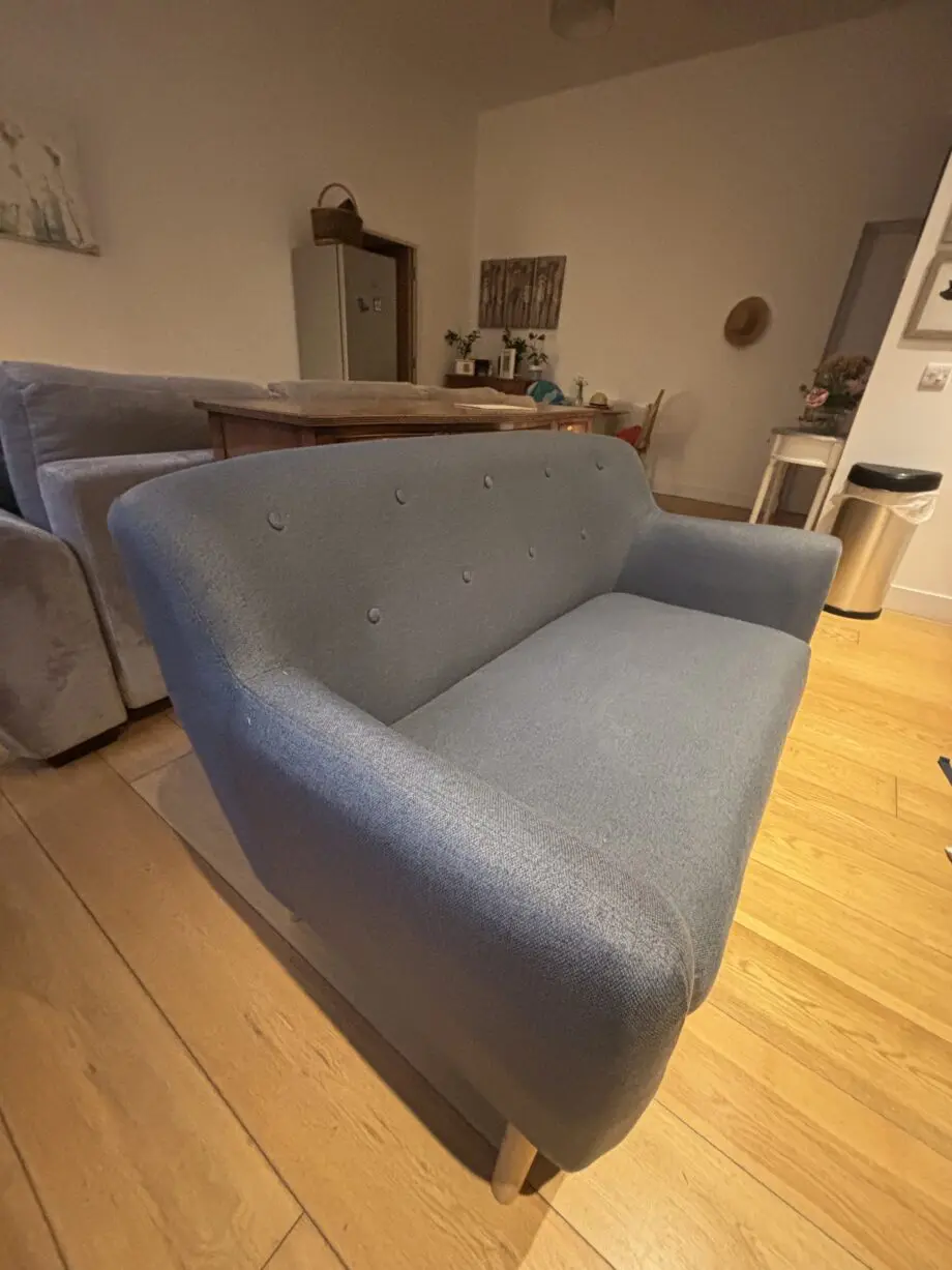 Two seat navy blue sofa