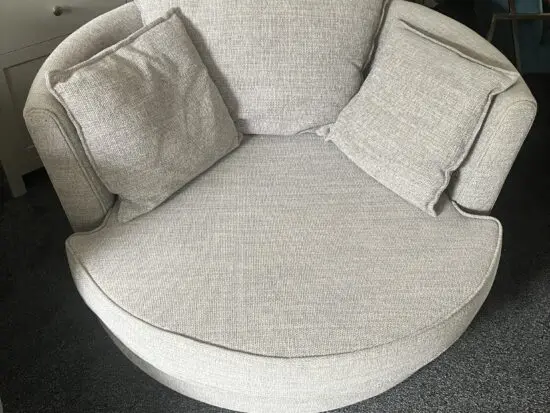DFS Grey swivel love chair