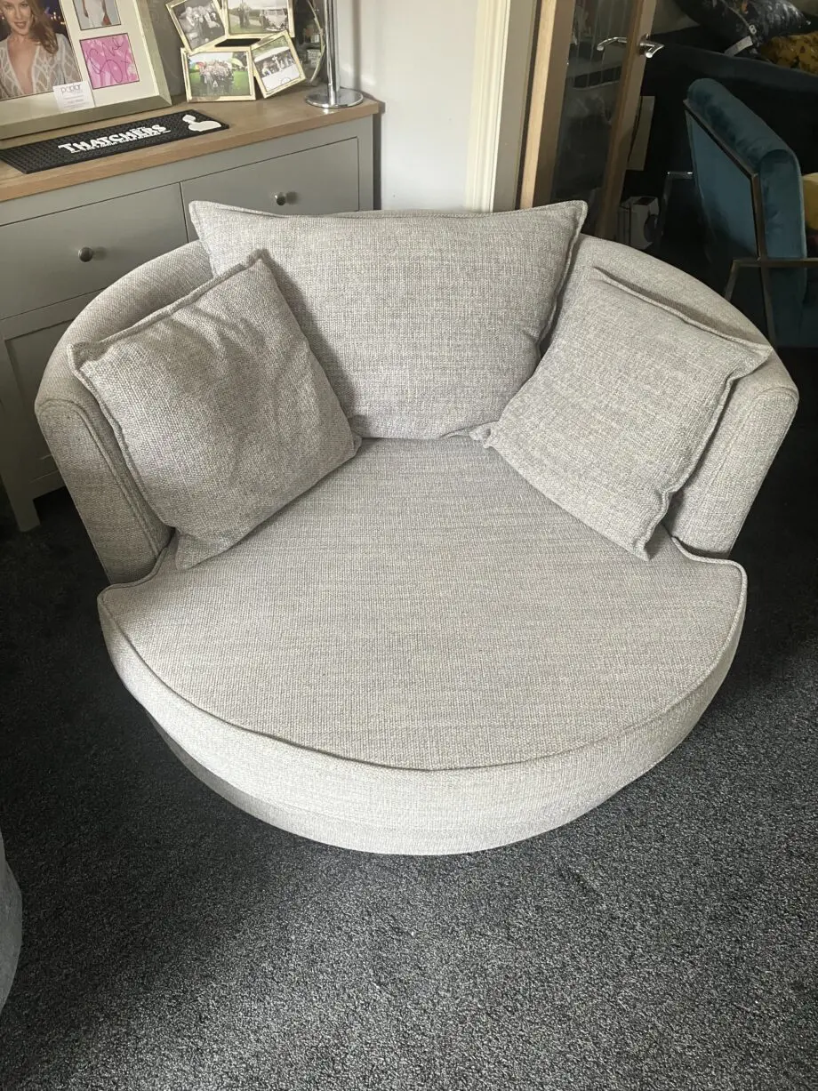 DFS Grey swivel love chair