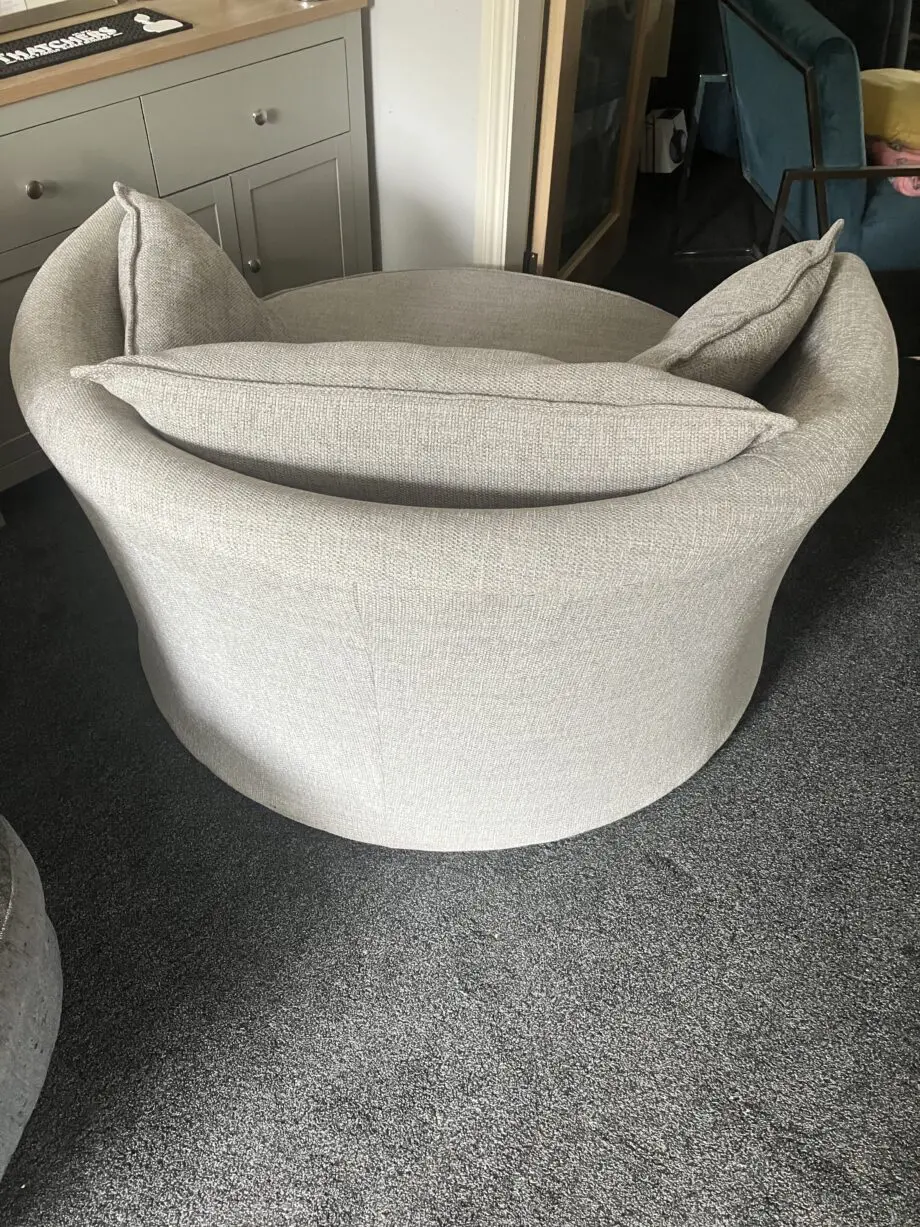DFS Grey swivel love chair