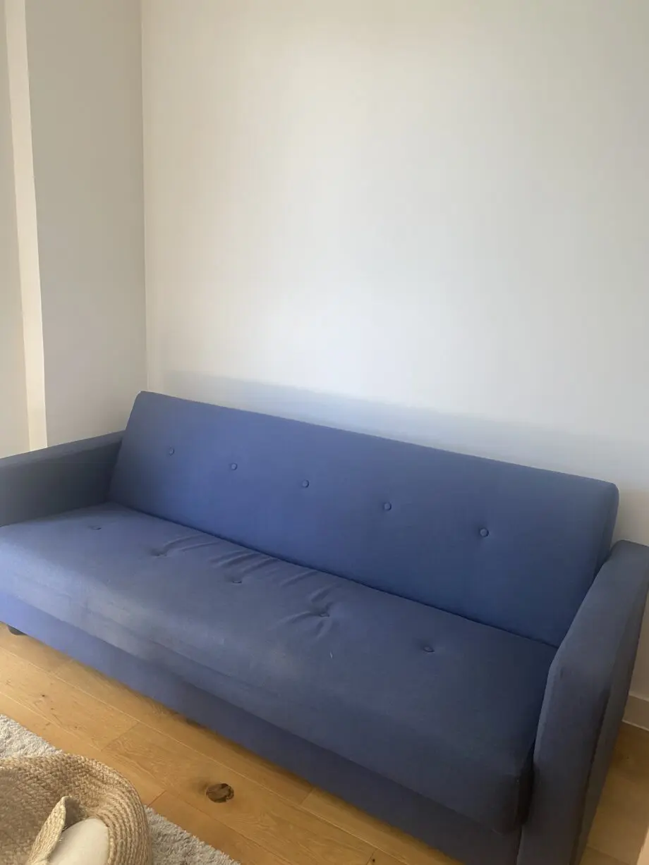 MADE Chou sofa bed - click clack 3 seater sofa. Navy blue with storage.