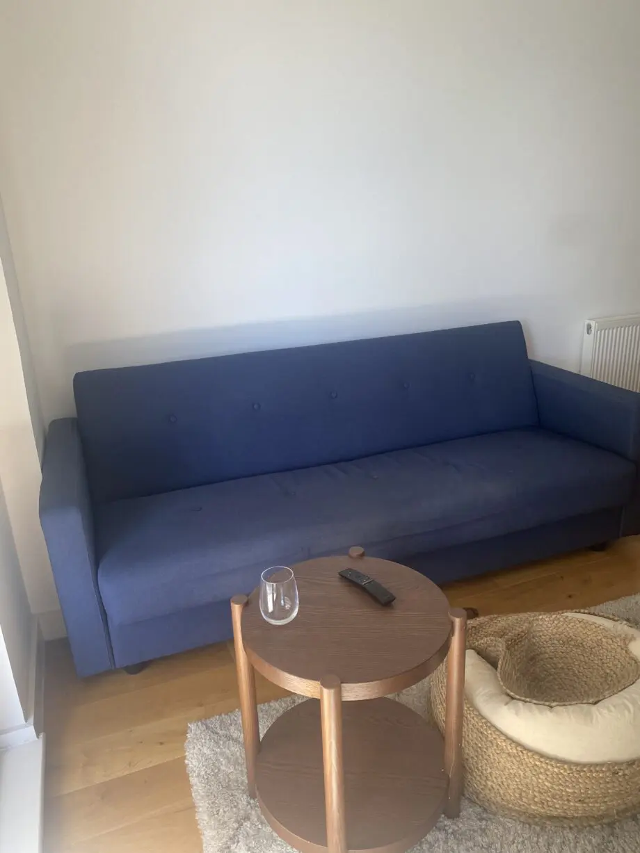 MADE Chou sofa bed - click clack 3 seater sofa. Navy blue with storage.