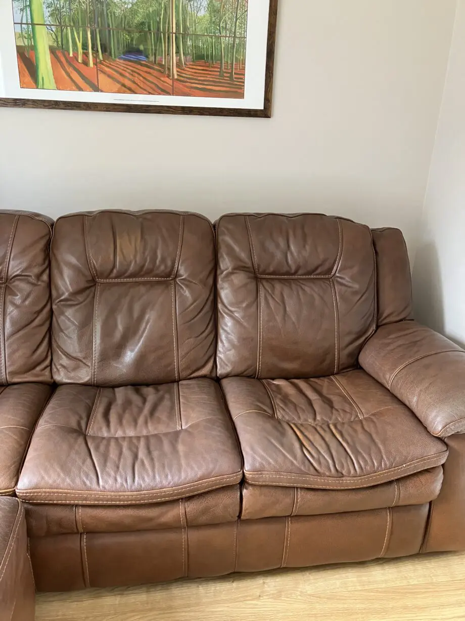 DFS Leather Sofa with storage footstool