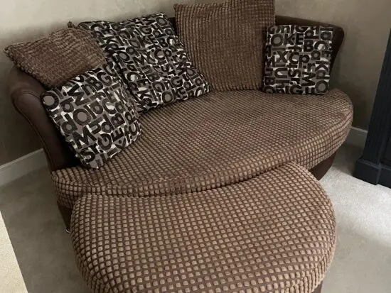 Snuggle corner sofa with footstool