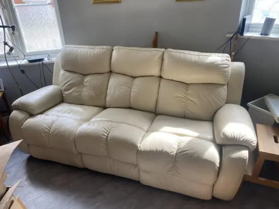 Cream leather electric reclining sofa