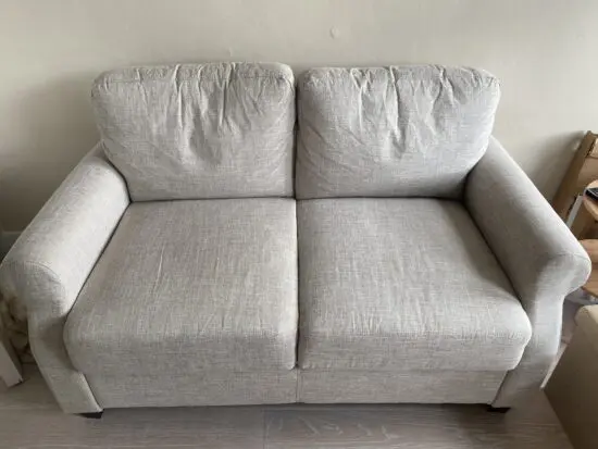 Beige two seater Wayfair sofa