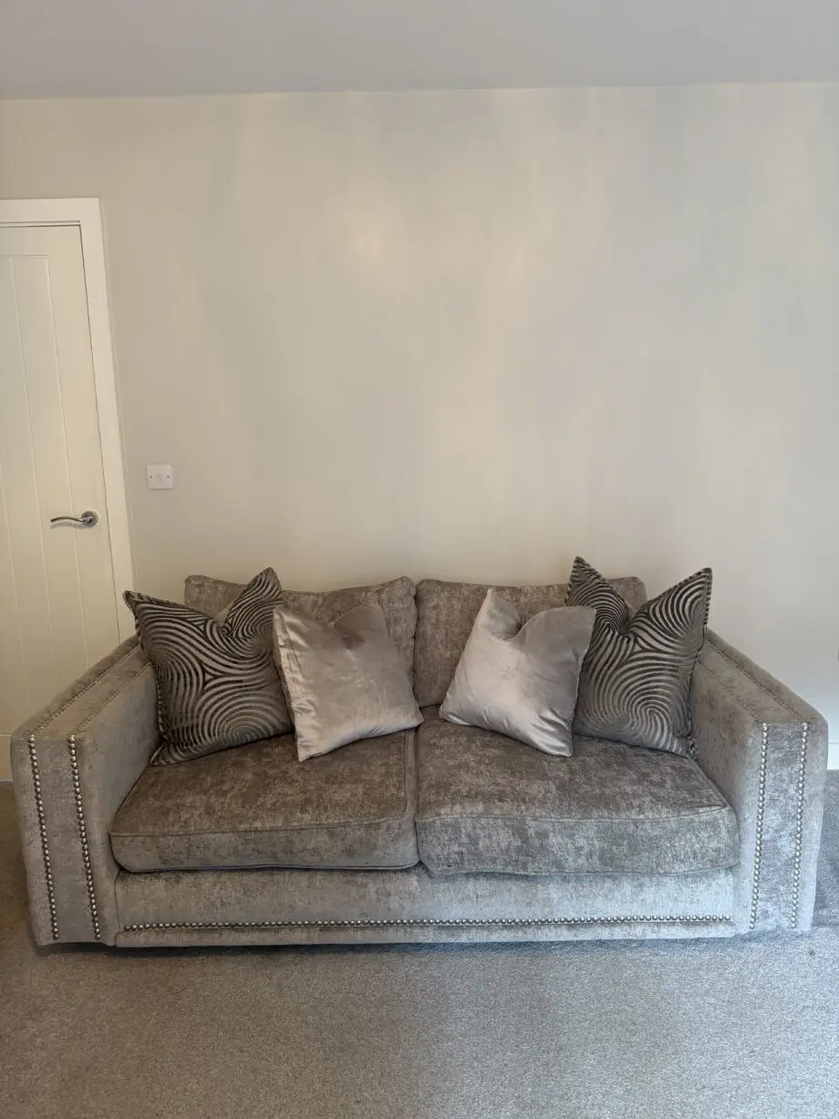 Two 3 seater grey Midas Sofology sofas with cleaning kit included