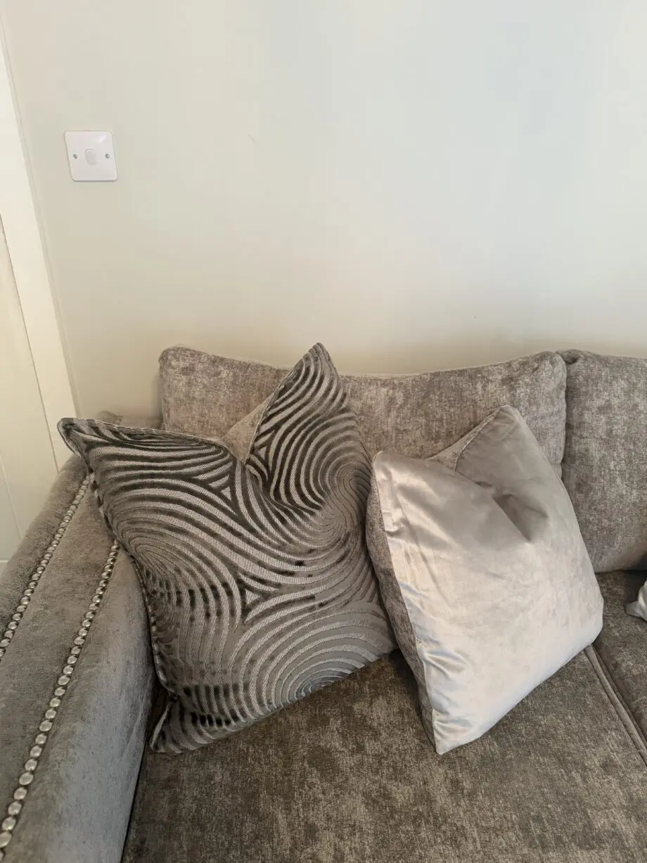 Two 3 seater grey Midas Sofology sofas with cleaning kit included