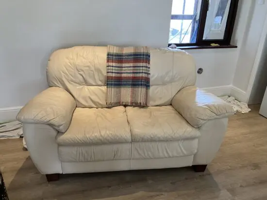 2 matching cream leather sofas