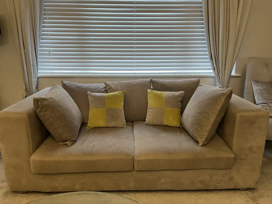 2 seater sofa with cushions