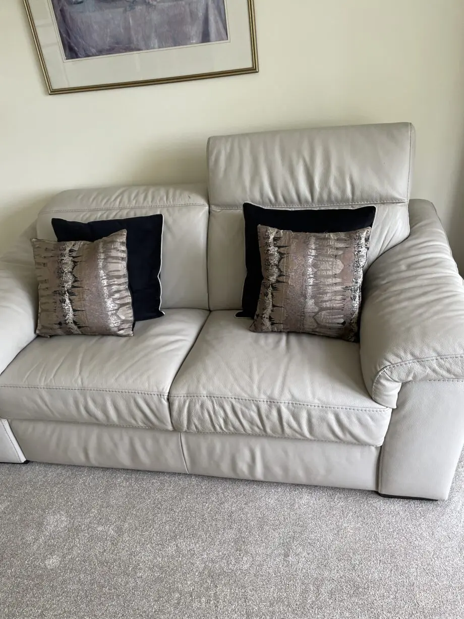 Reclining leather sofa and matching two seater sofa beige