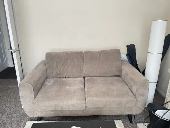 Brown 2 seater sofa