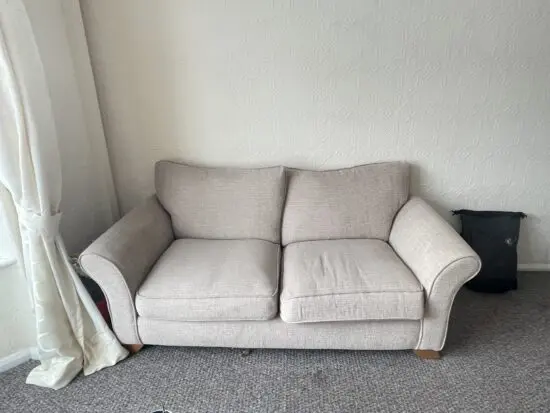 Cream 2 seater sofa