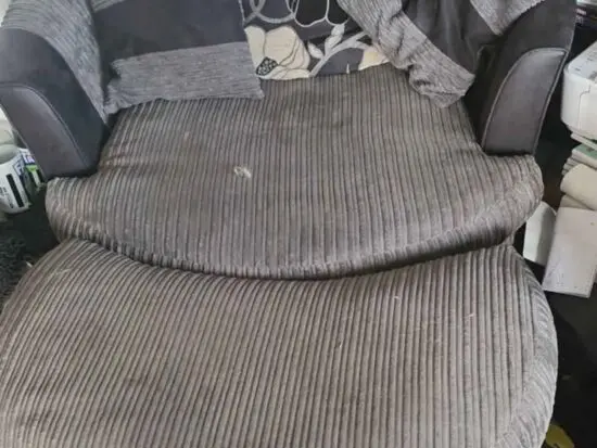 DFS GREY cuddle chair and pouffe