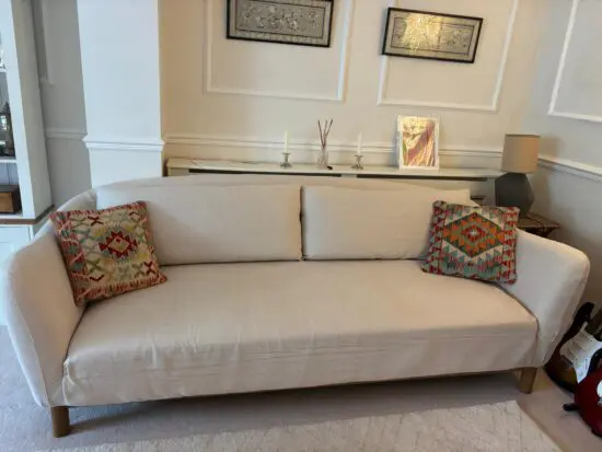 2 x Amber Lewis for Anthropologie Belgian Linen Curved Sofas Cream