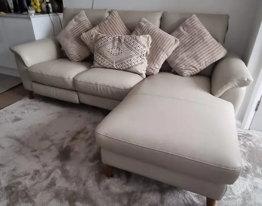 Furniture Village leather 3 seater with recliner worth £1995