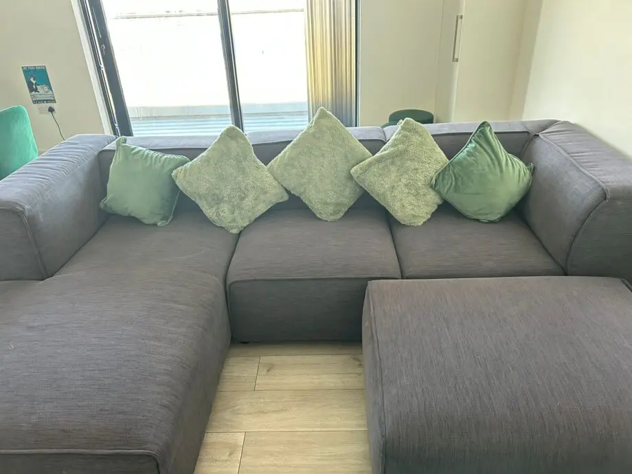 BoConcept 3 seater corner group with foot stool.