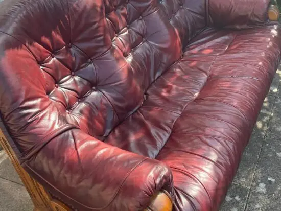 DFS burgundy leather sofa oak frame