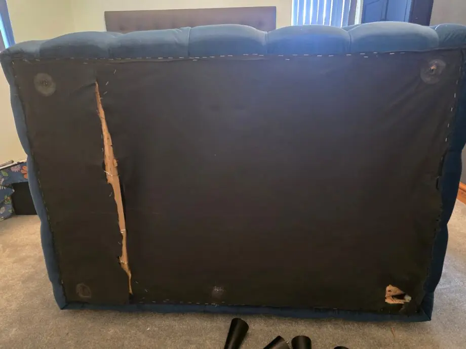 Blue Cuddle Sofa with broken back foot