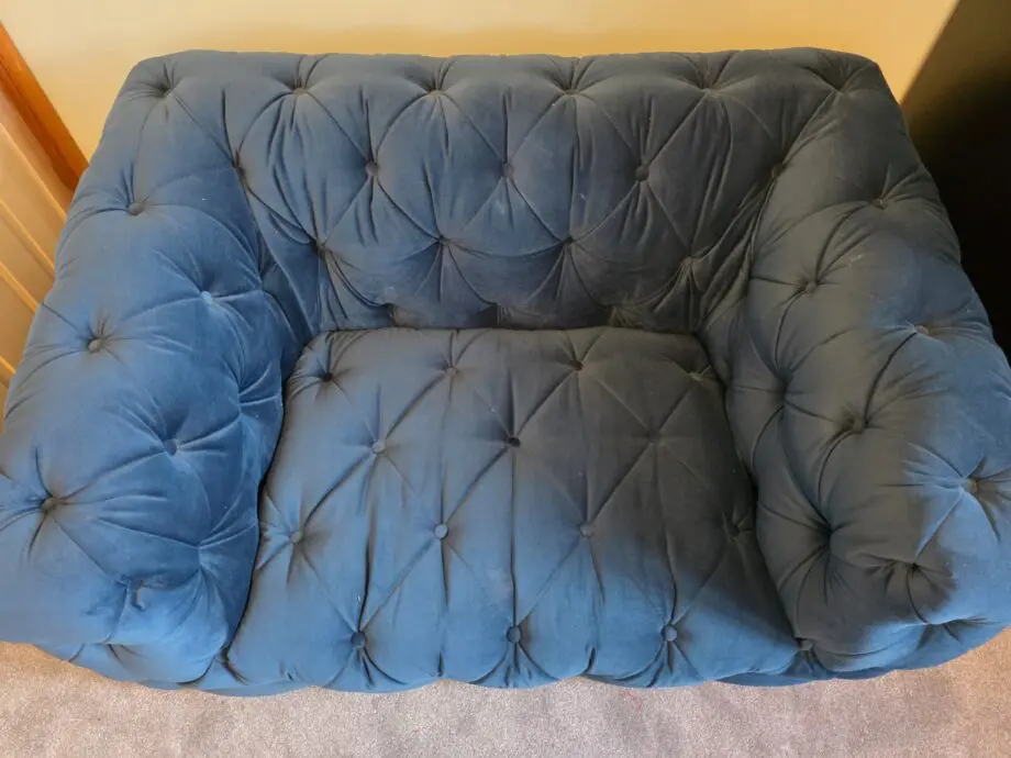 Blue Cuddle Sofa with broken back foot