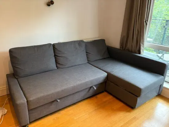 FRIHETEN Corner sofa-bed with storage, Skiftebo dark grey