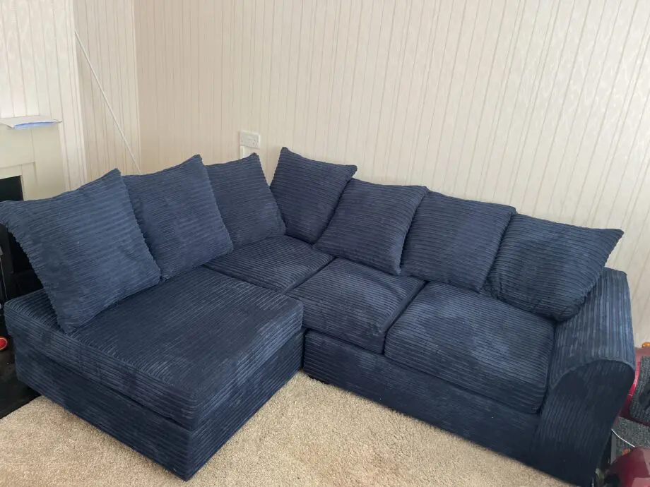 Debenhams corner sofa in navy blue