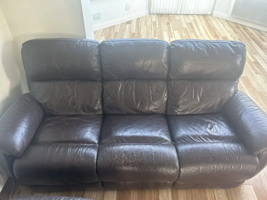 DFS brown leather sofa with recliners - fully operational