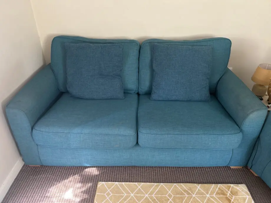 This has had 2 previous owners. First owner hadn’t used it, it’s been kept in good condition. The sofa is soft blue, it provides comfort and uplifts the room.