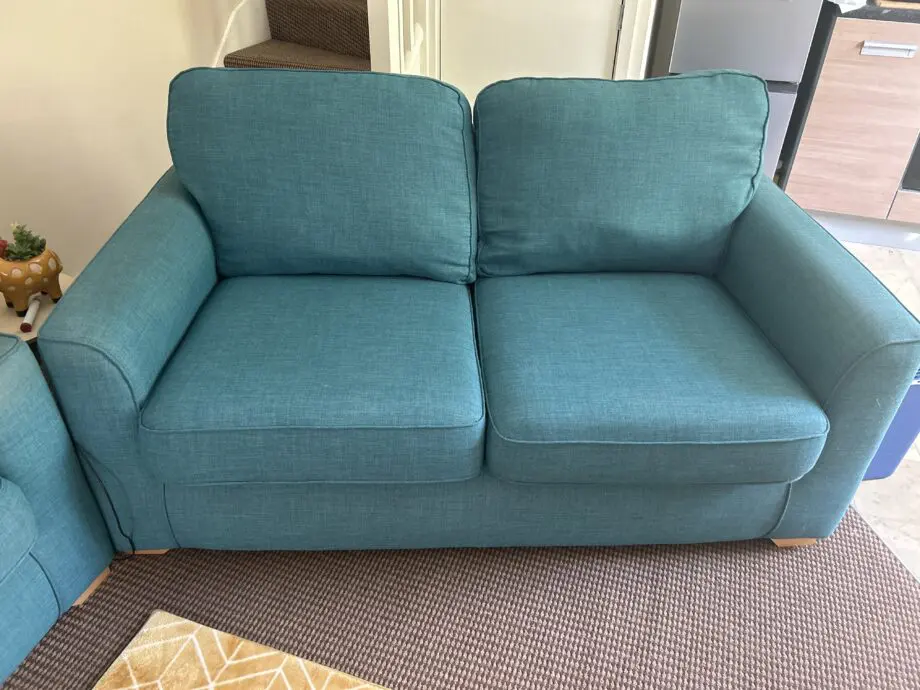 This has had 2 previous owners. First owner hadn’t used it, it’s been kept in good condition. The sofa is soft blue, it provides comfort and uplifts the room.