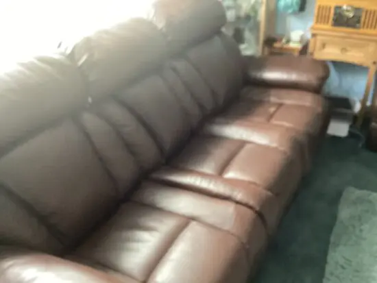 DFS Leather 3 seater electric recliners settee
