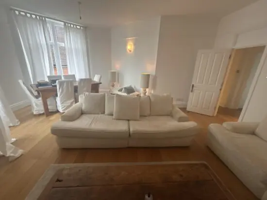 One large 4 seater sofa with matching scatter cushioning made by DFS and a 3 seater sofa matching