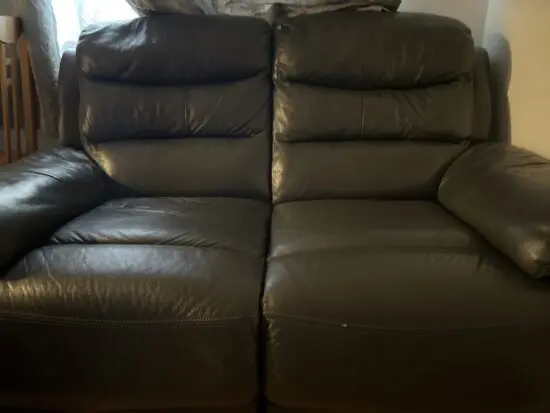 DFS black two seat expandable sofa