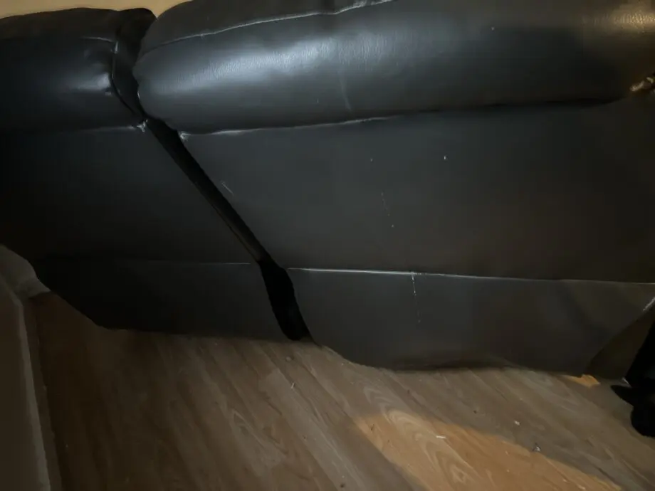 DFS black two seat expandable sofa