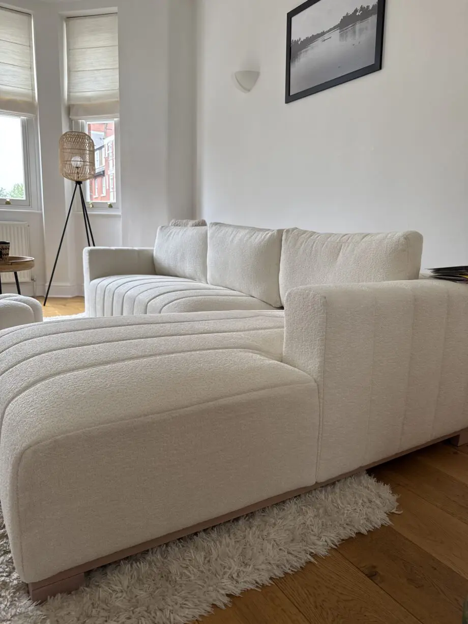 Belsize beige boucle sofa with wooden base, large chaise right hand facing