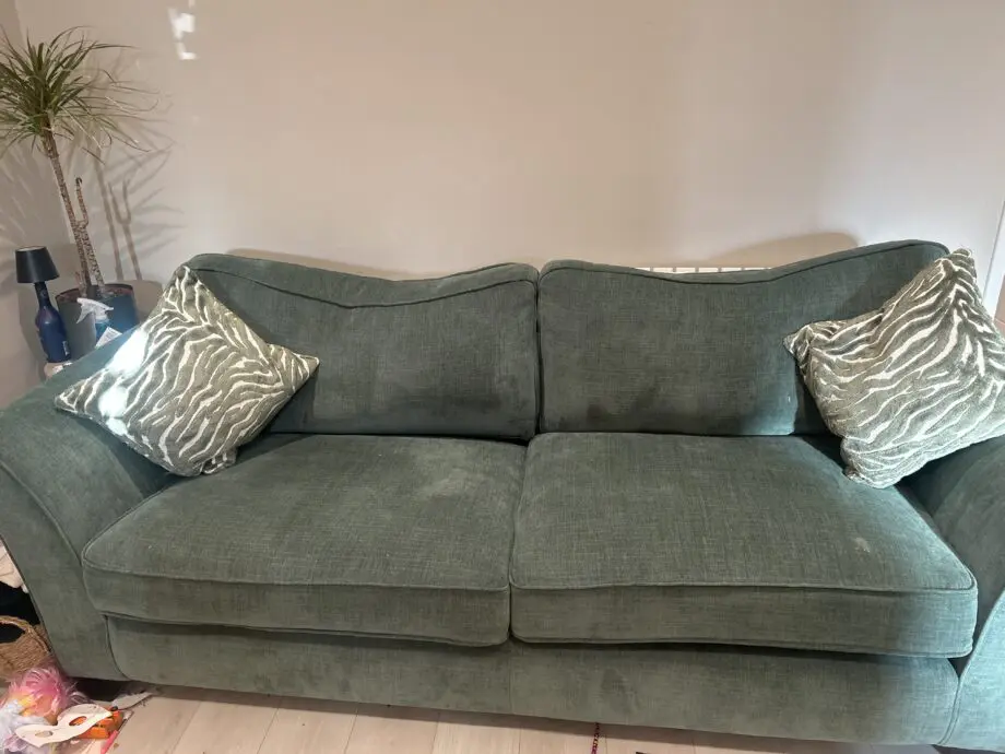 Furniture Village green sofa