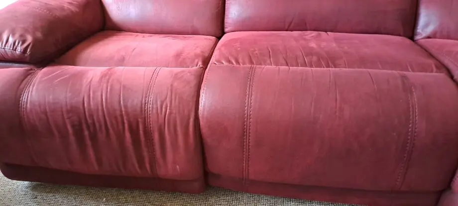 Large soft red leather corner sofa. Seats 5.
