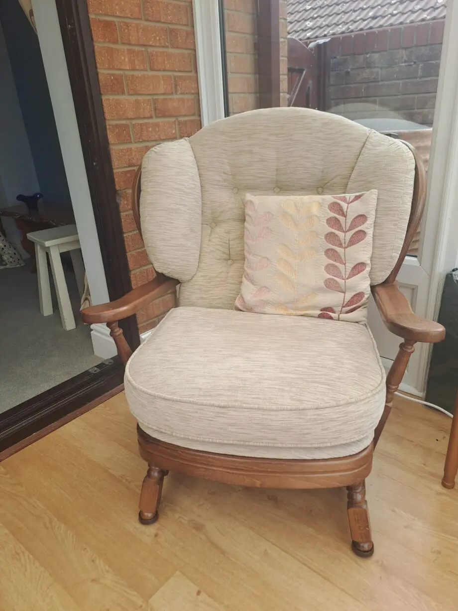 Wooden framed two Seater sofa and two arm chairs.