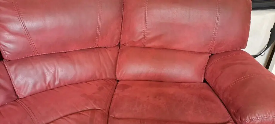Large soft red leather corner sofa. Seats 5.