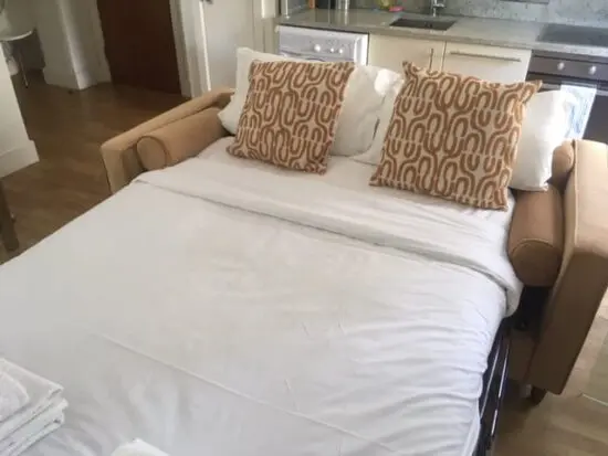 Dunelm Caramel Velvet Double sofa bed